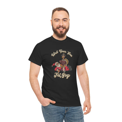 ***LIMITED EDITION*** Turkey vs. Santa - "Wait Your Turn Fat Boy" This Version Features a Black Santa. Unisex Heavy Cotton T-Shirt